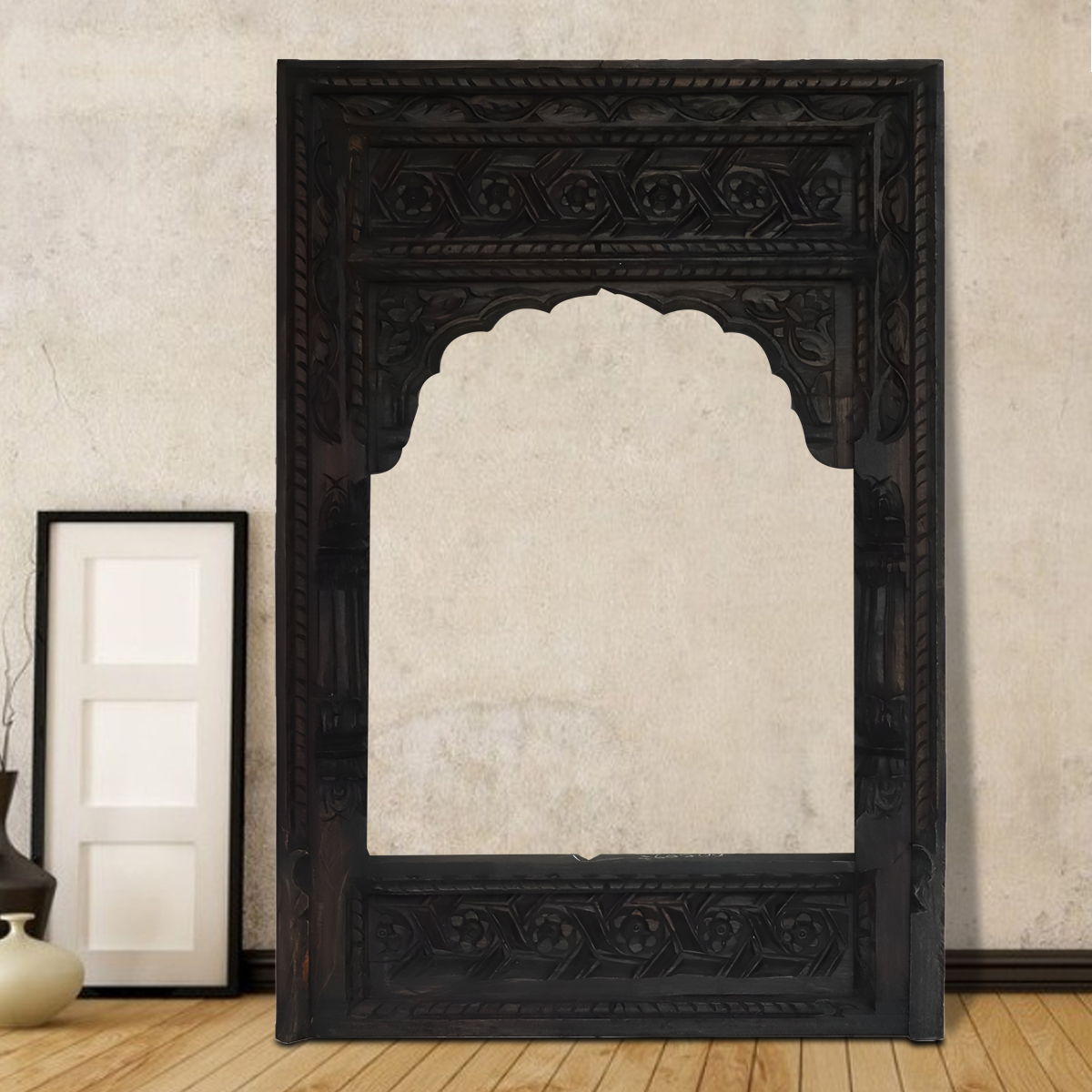 Carved wooden wall frame with intricate detailing