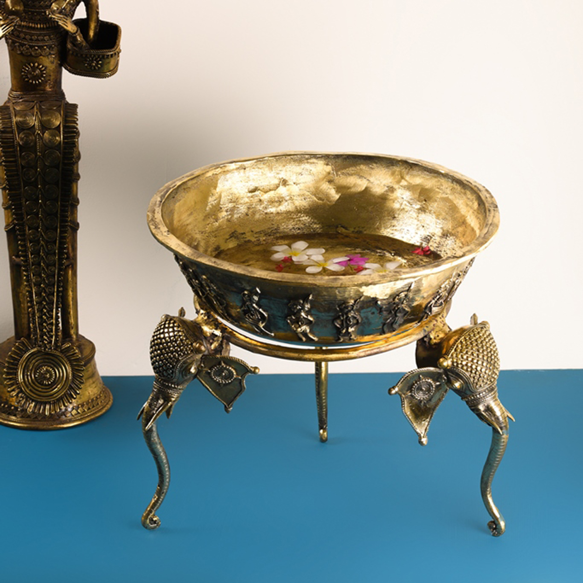 Handcrafted Dhokra brass urli used as a decorative bowl