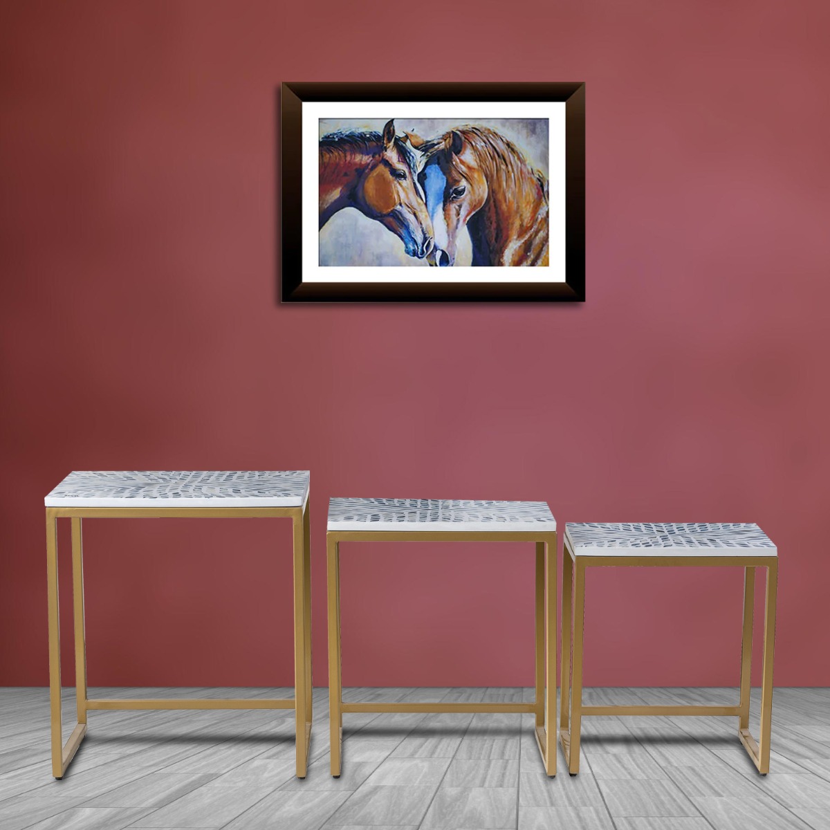 Set of three nesting tables with decorative metal frame and artistic patterned tops