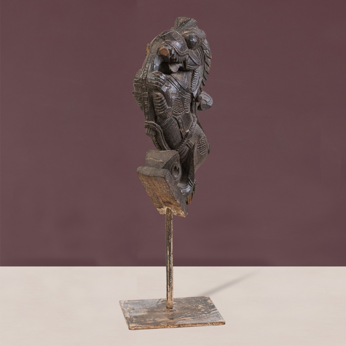 Desma horse figurine on stand with rustic wood finish